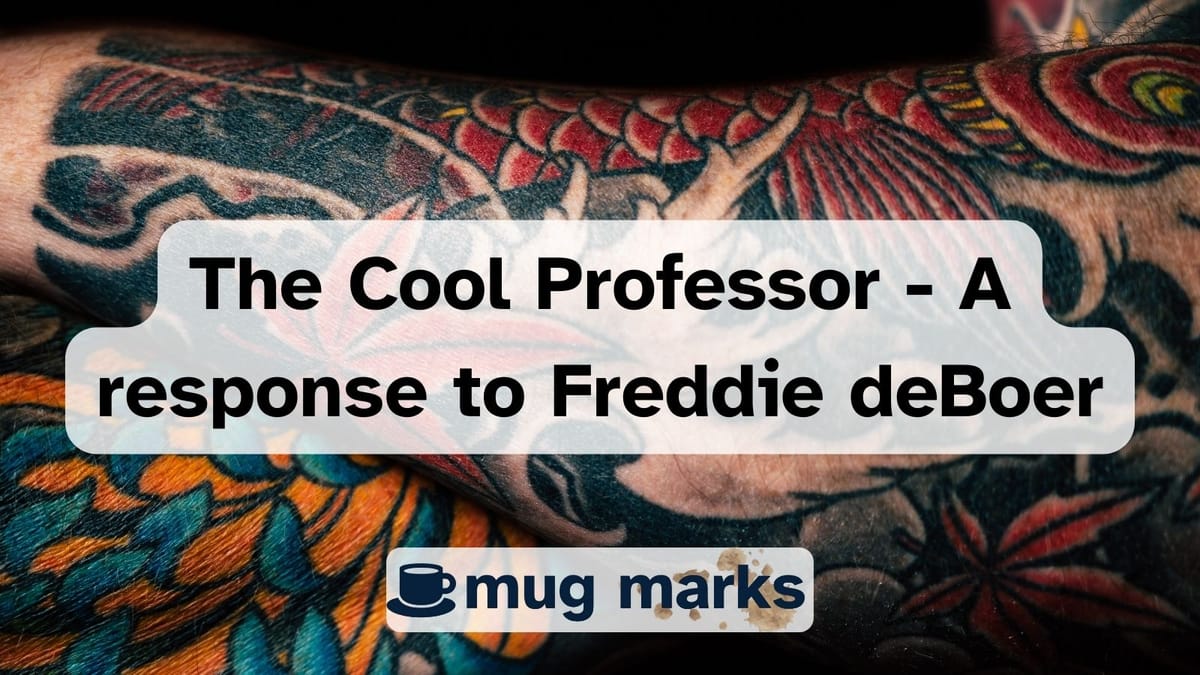 Tattooed arms crossed as a background to the title of the article.